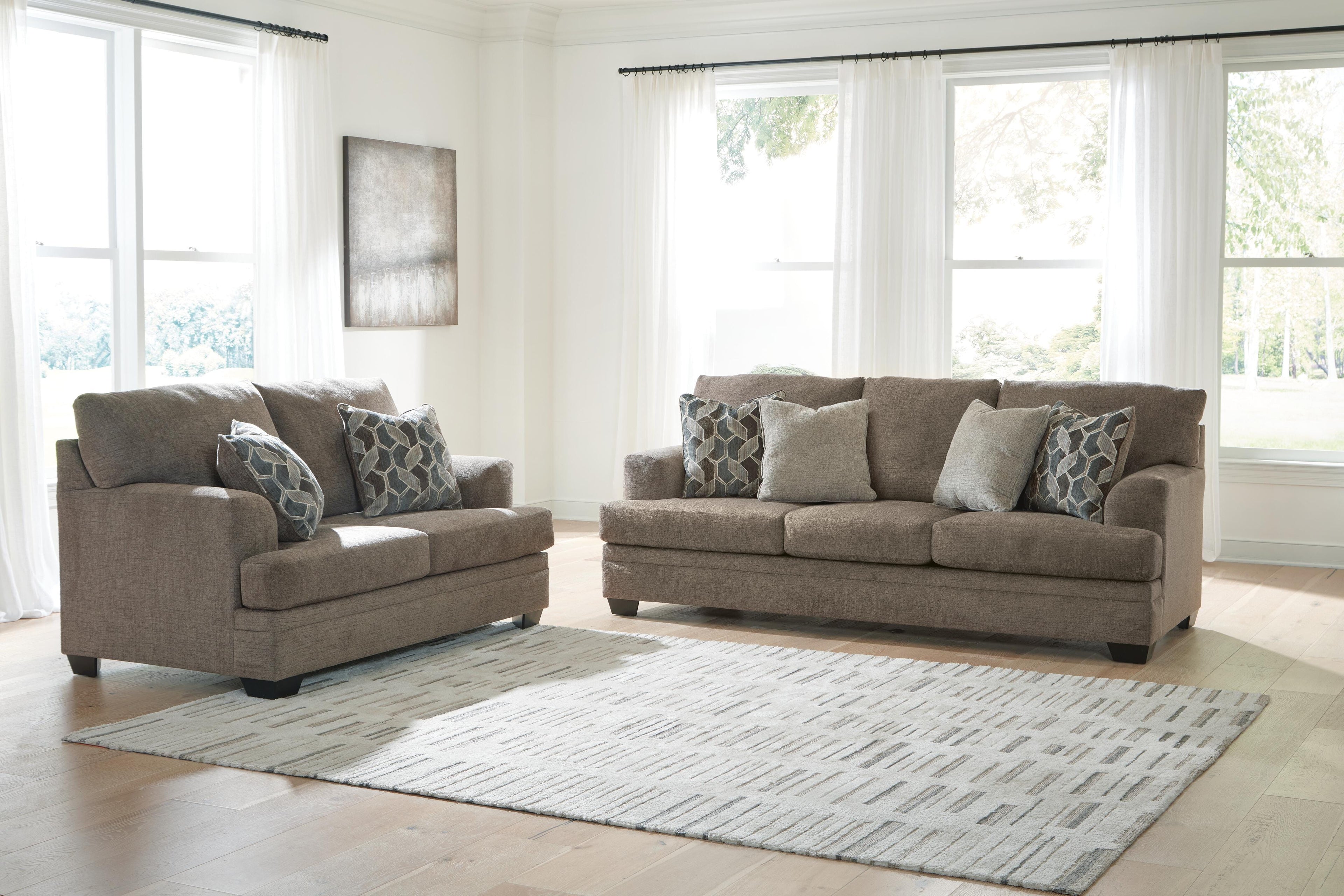 Stonemeade Sofa and Loveseat - Nutmeg