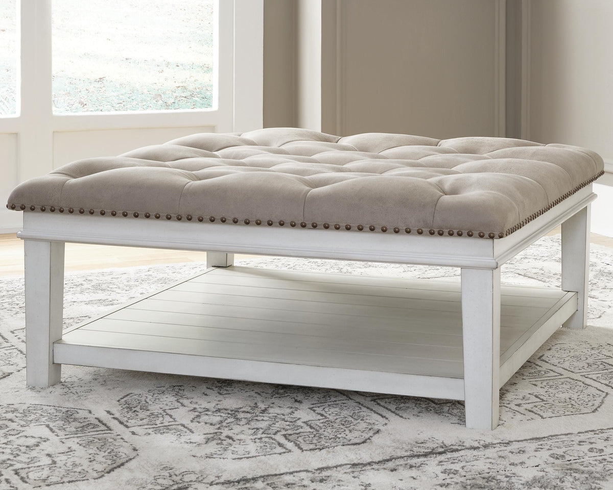 Kanwyn UPH Ottoman Cocktail Table - Grayish Brown/White