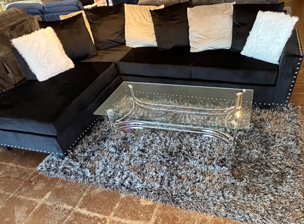 COMPLETE PACKAGE WITH BLACK SECTIONAL, COFFEE TABLE AND RUG