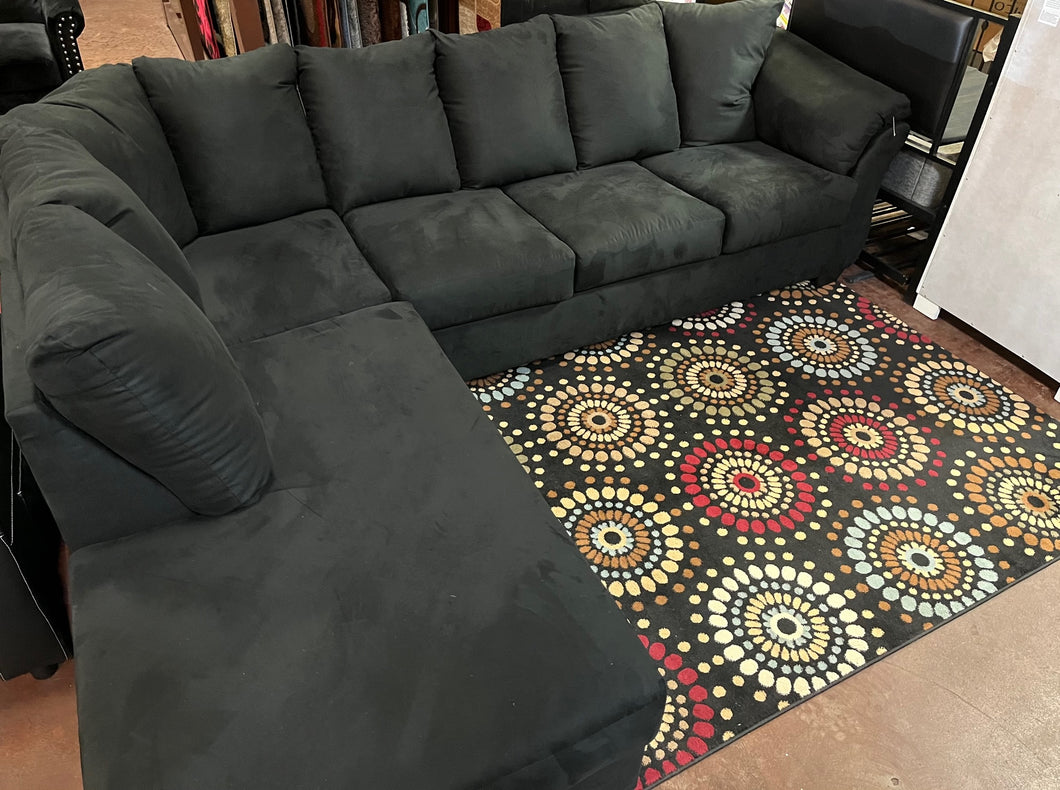 BLACK SECTIONAL WITH RUG