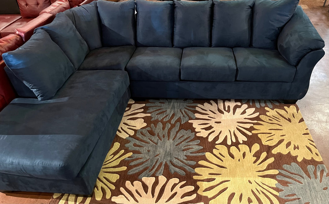 BLUE SECTIONAL AND RUG